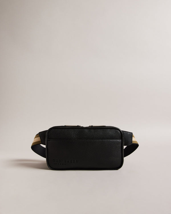 FABE-Bags-Introducing FABE, the faux leather belt bag that combines style and convenience in one sleek package. This hands-free hero keeps your essentials by your side whether you're exploring a new city or dancing the days away through festival season. Belt bag Faux leather Adjustable webbing strap Zip fastening Side release buckle Dimensions: 5cm x 12.5cm x 22.5cm- Ted Baker Romania
